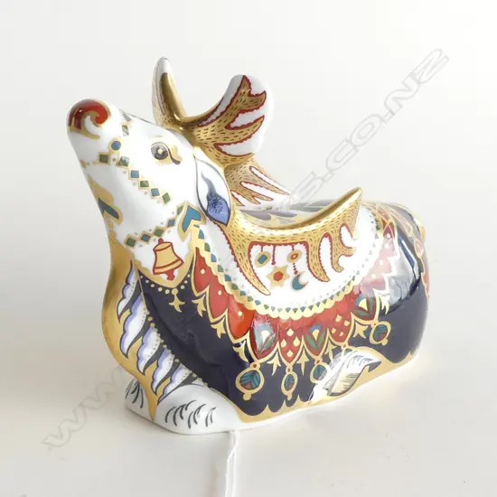 A Royal Crown Derby porcelain paperweight Reindeer